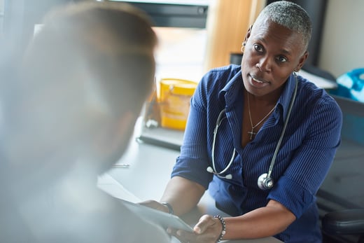GP talking to patient